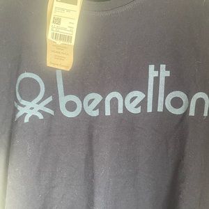 New navy T-shirt purchases in Europe and never worn.